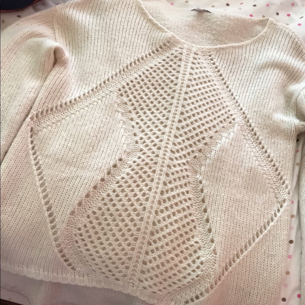 Delia’s sweater.